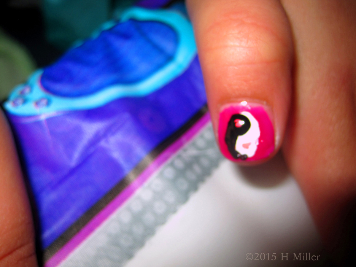 And A Yin Yang Symbol On Her Thumb 