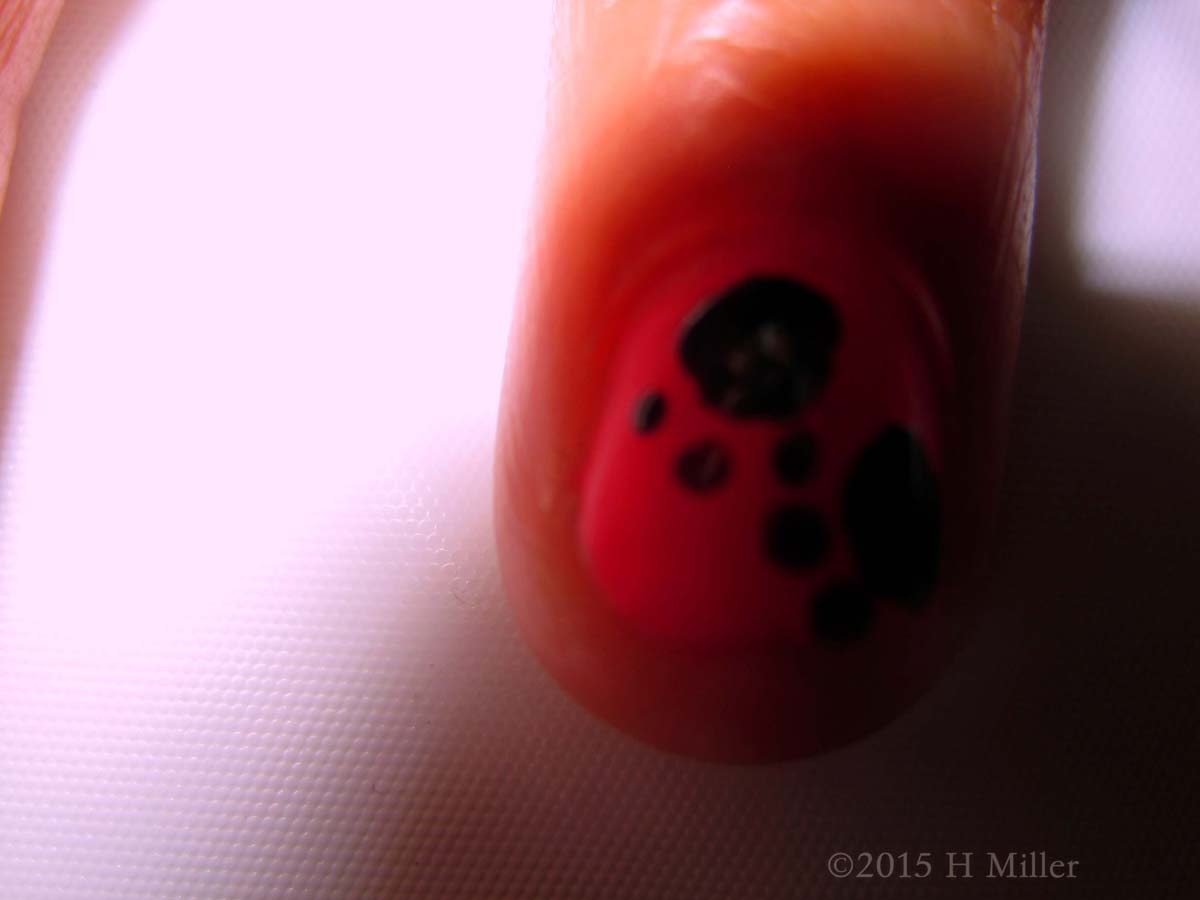 More Doggie Paws Fit On Her Other Nails 
