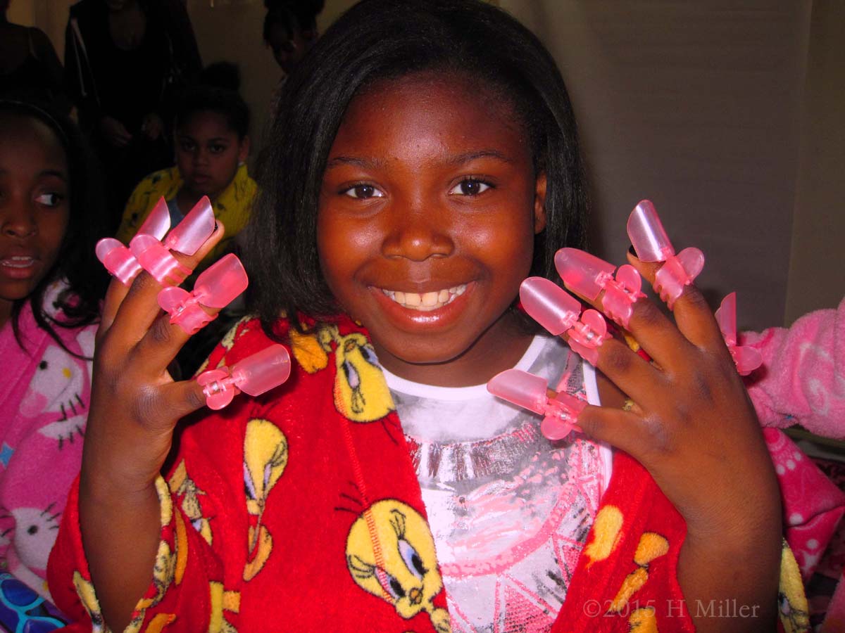 Showing Off Her Nail Protectors 