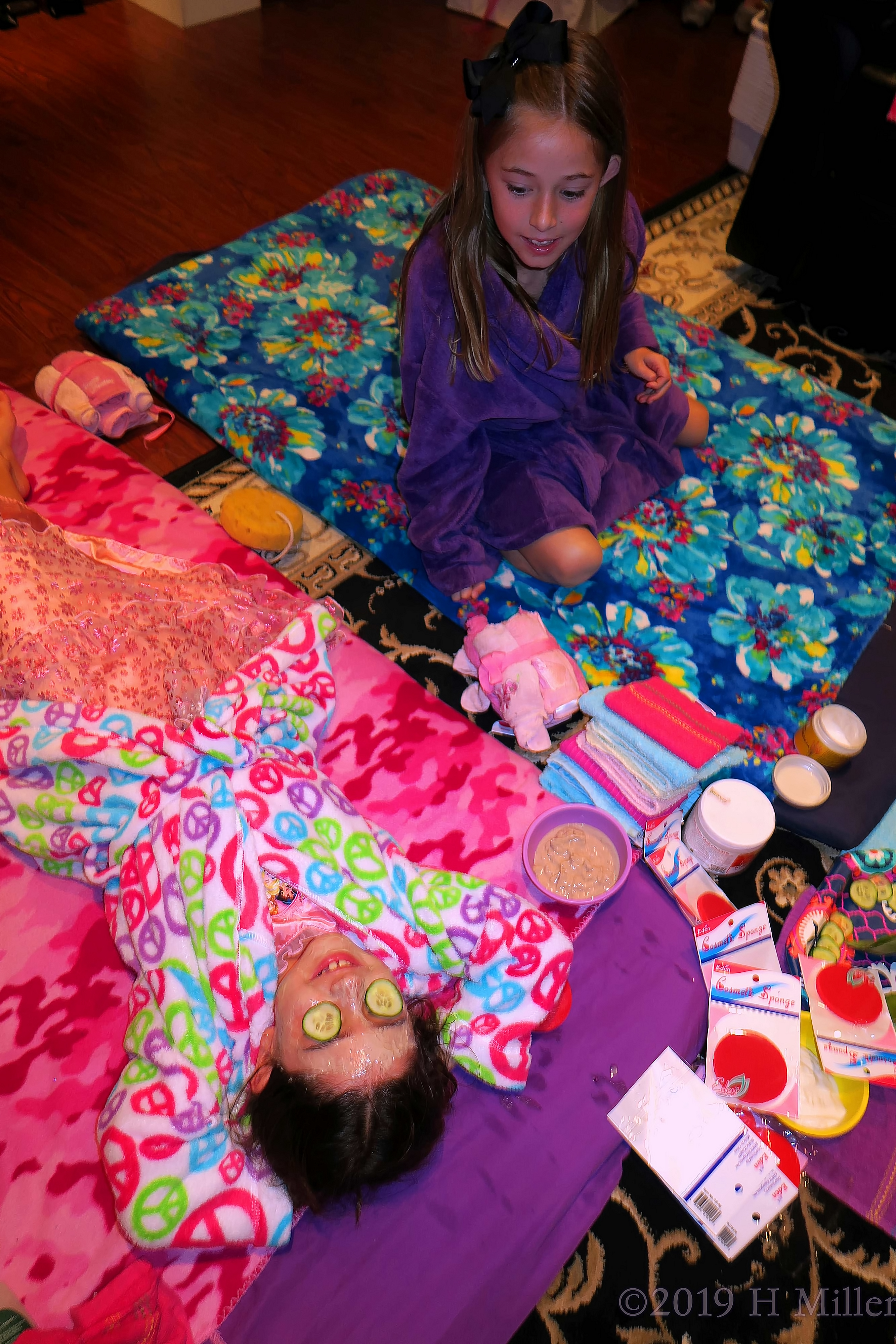 Girls Are Busy Talking While Having Kids Facials Girls Are Busy Talking While Having Kids Facials