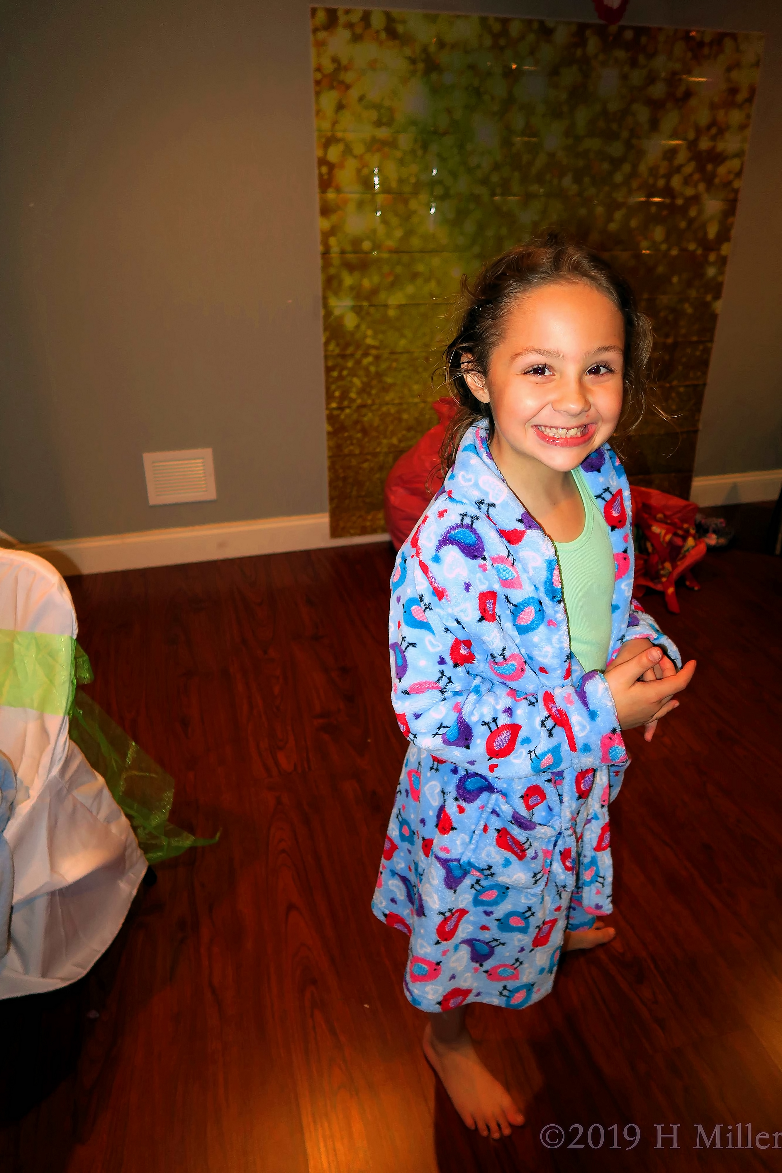 Smiling Girl Wearing A Cute Peacock Spa Robe 