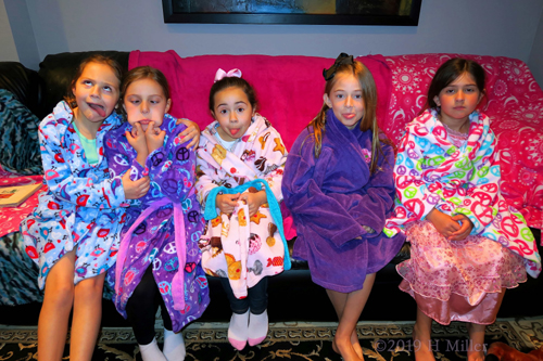 Girls Are Making Funny Faces At Their Friend's Birthday Party Girls Are Making Funny Faces At Their Friend's Birthday Party