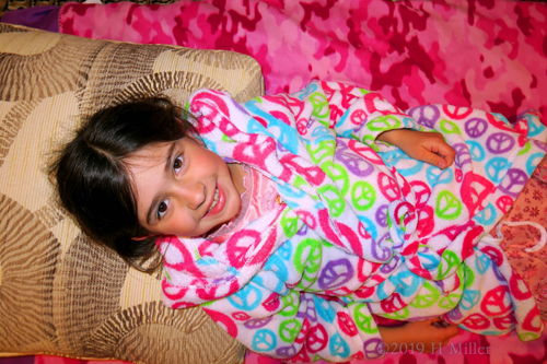 She Is Wearing A Colorful Spa Robe She Is Wearing A Colorful Spa Robe