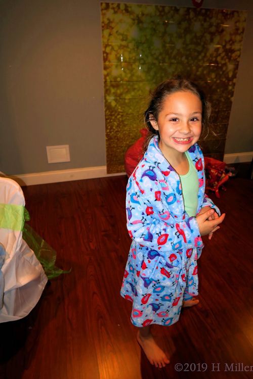 Smiling Girl Wearing A Cute Peacock Spa Robe