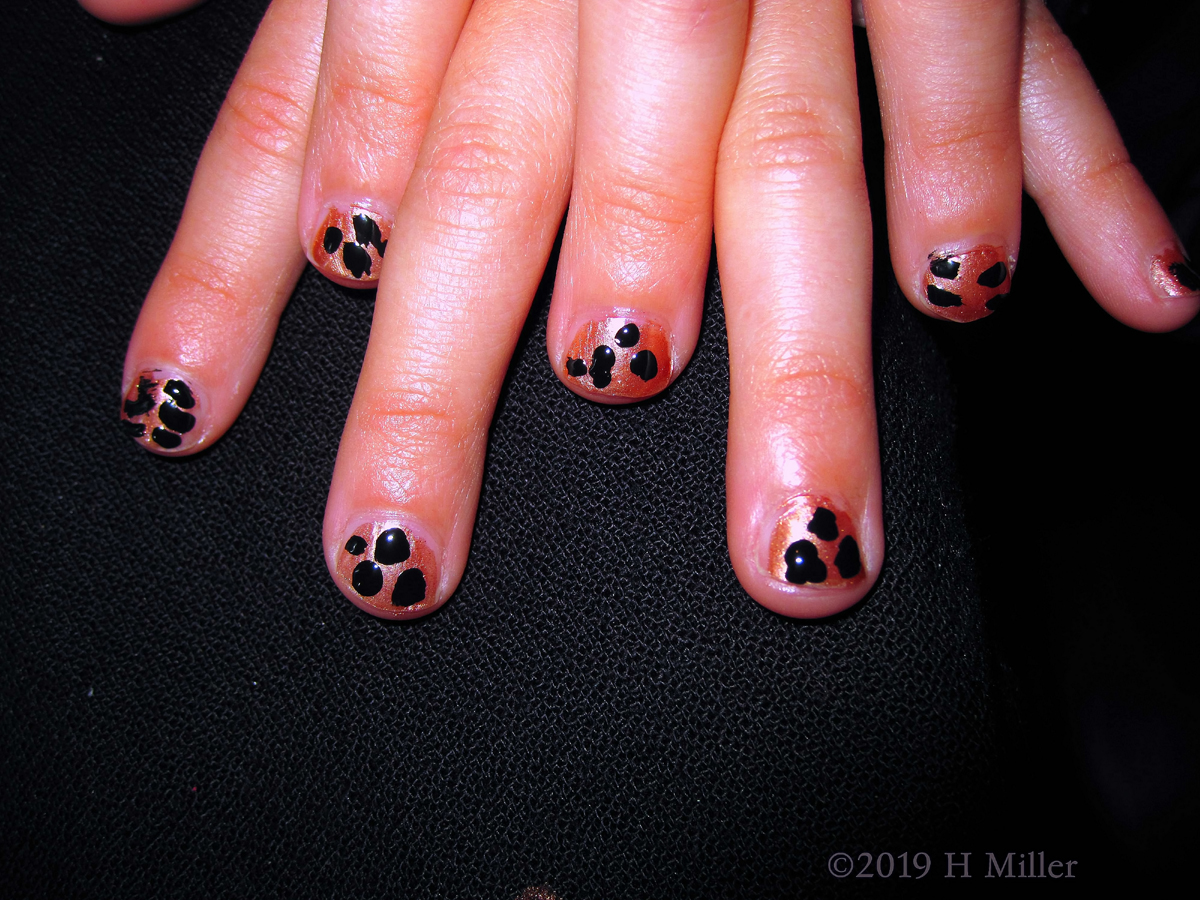 What A Cute Animal Spot Nail Design On This Guest's Kids Manicure!
