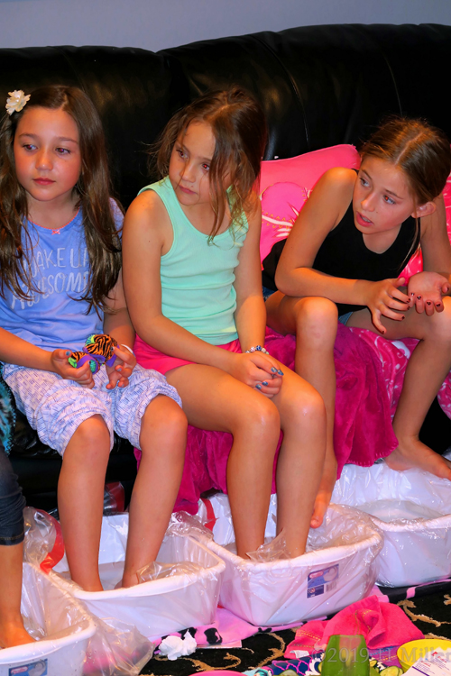Girls Chitchat While Doing Kids Pedicures Girls Chitchat While Doing Kids Pedicures
