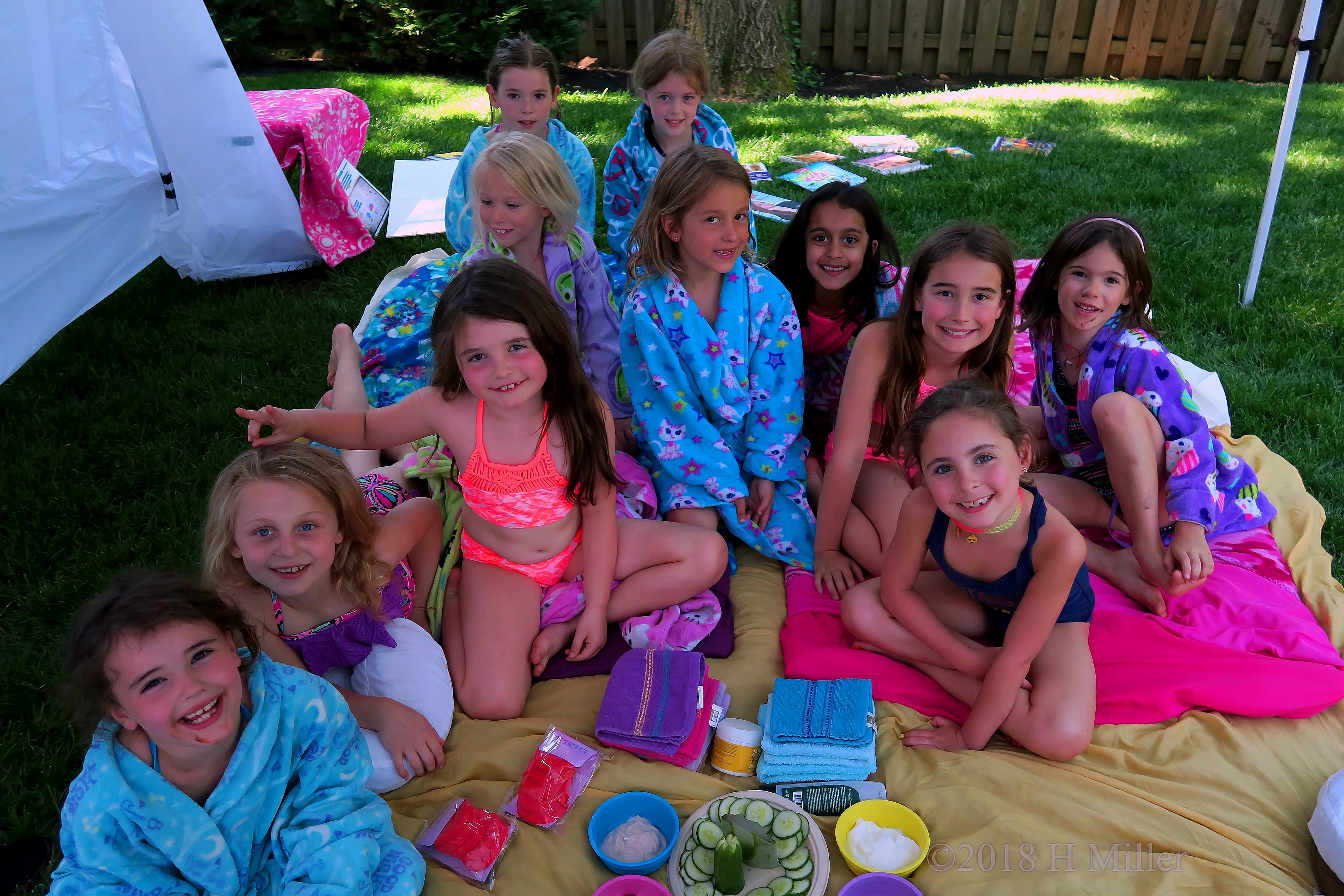 Group Photo Of The Girls Featuring Photo Bombing And Bunny Ears 