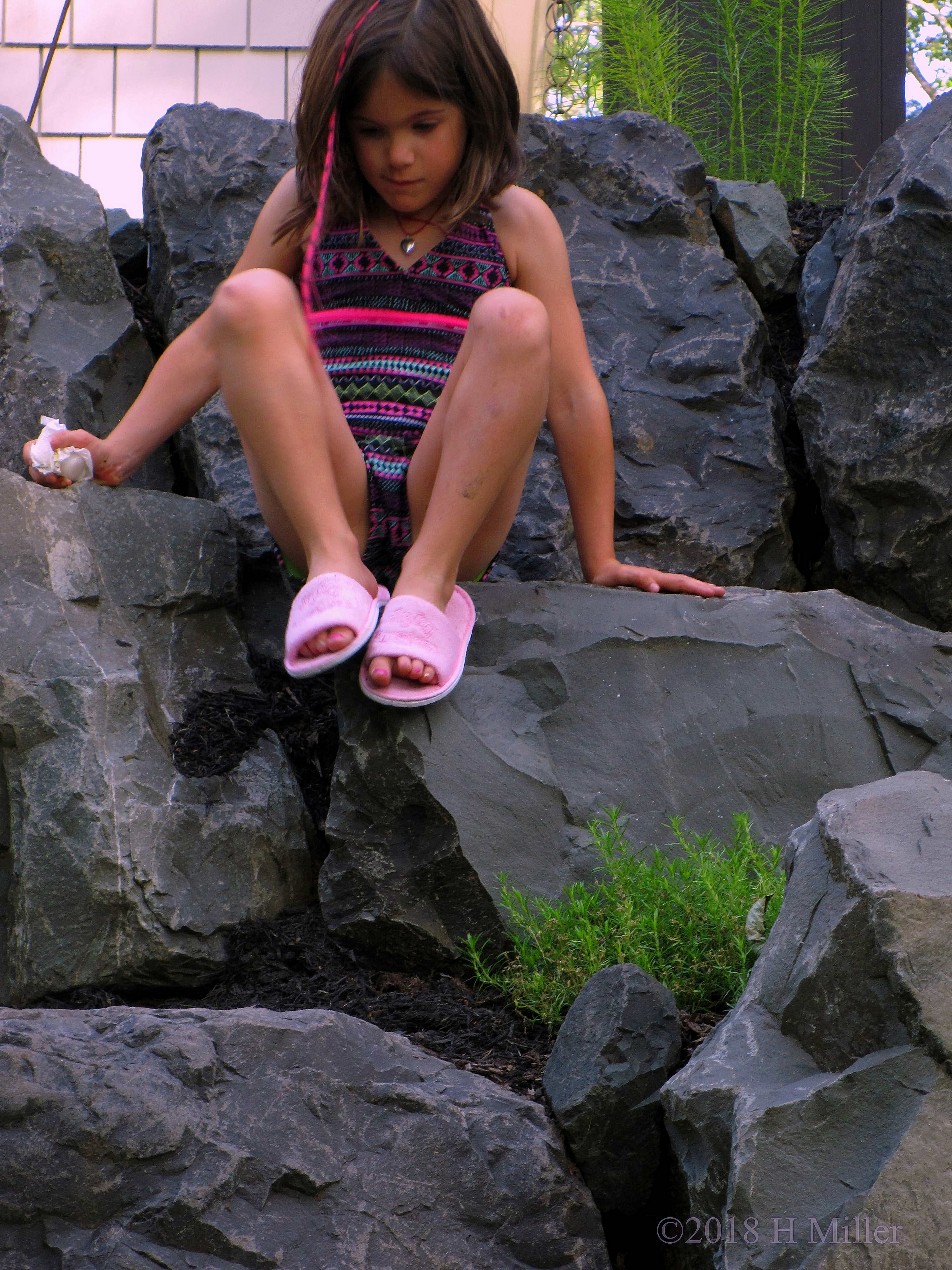 Party Guest Playing On Rocks