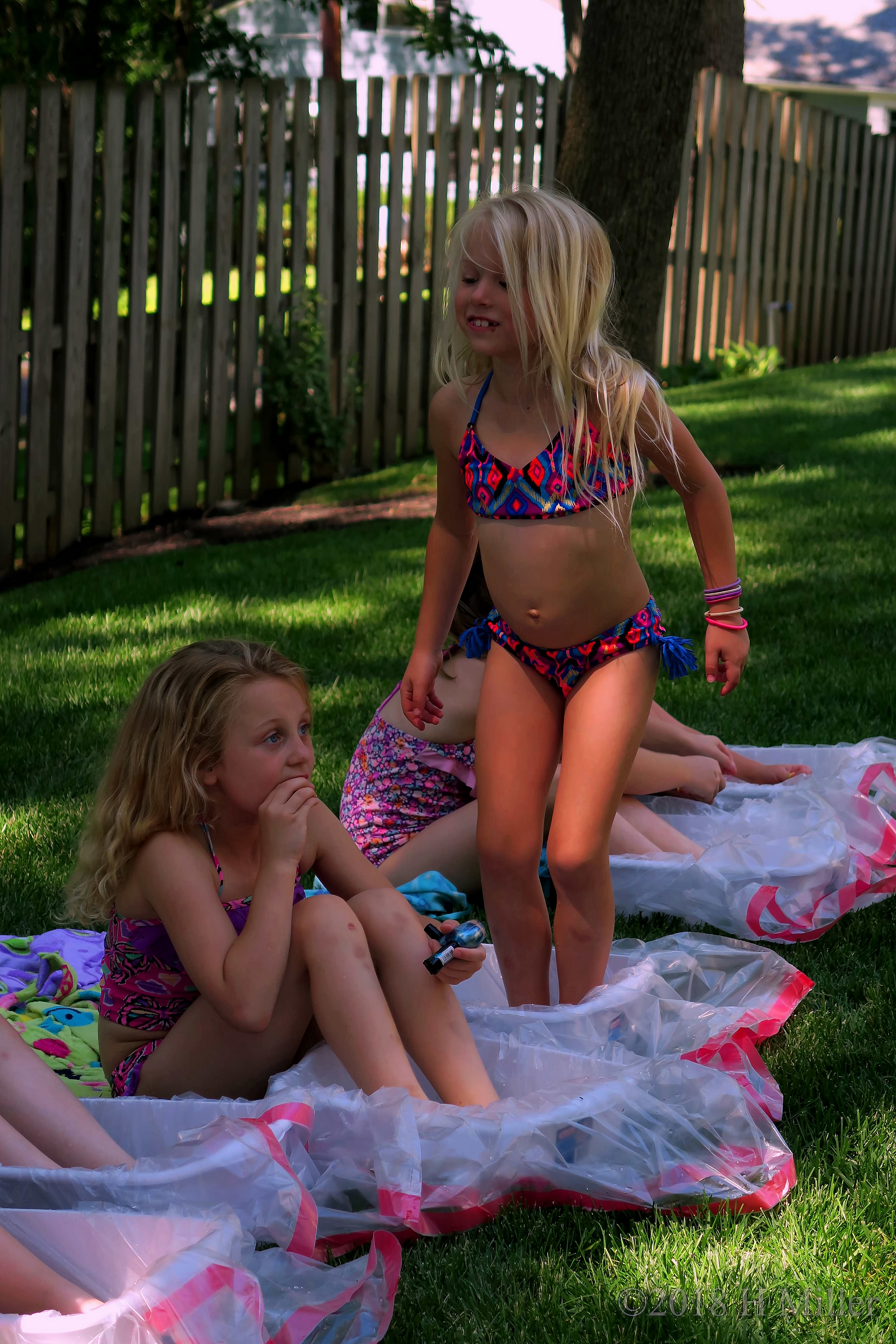 Party Guests Playing In Pedicure Footbath Tubs At The Spa Party For Girls. 4 Party Guests Playing In Pedicure Footbath Tubs At The Spa Party For Girls. 4