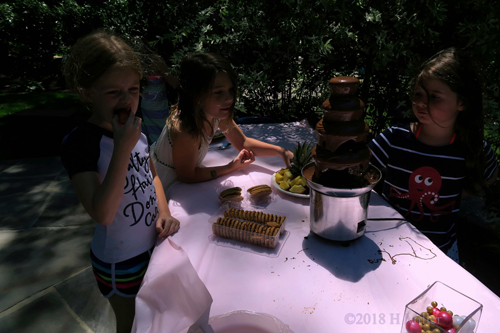 Trying Out Different Options On The Chocolate Fountain