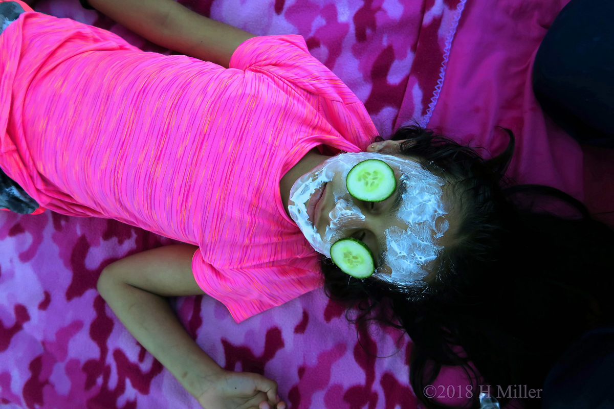 Cucumbers And Face Masques During Facials For Kids 