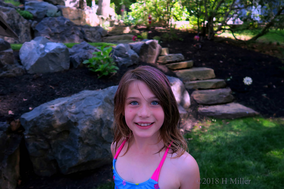 Posing In Front Of Rocks 