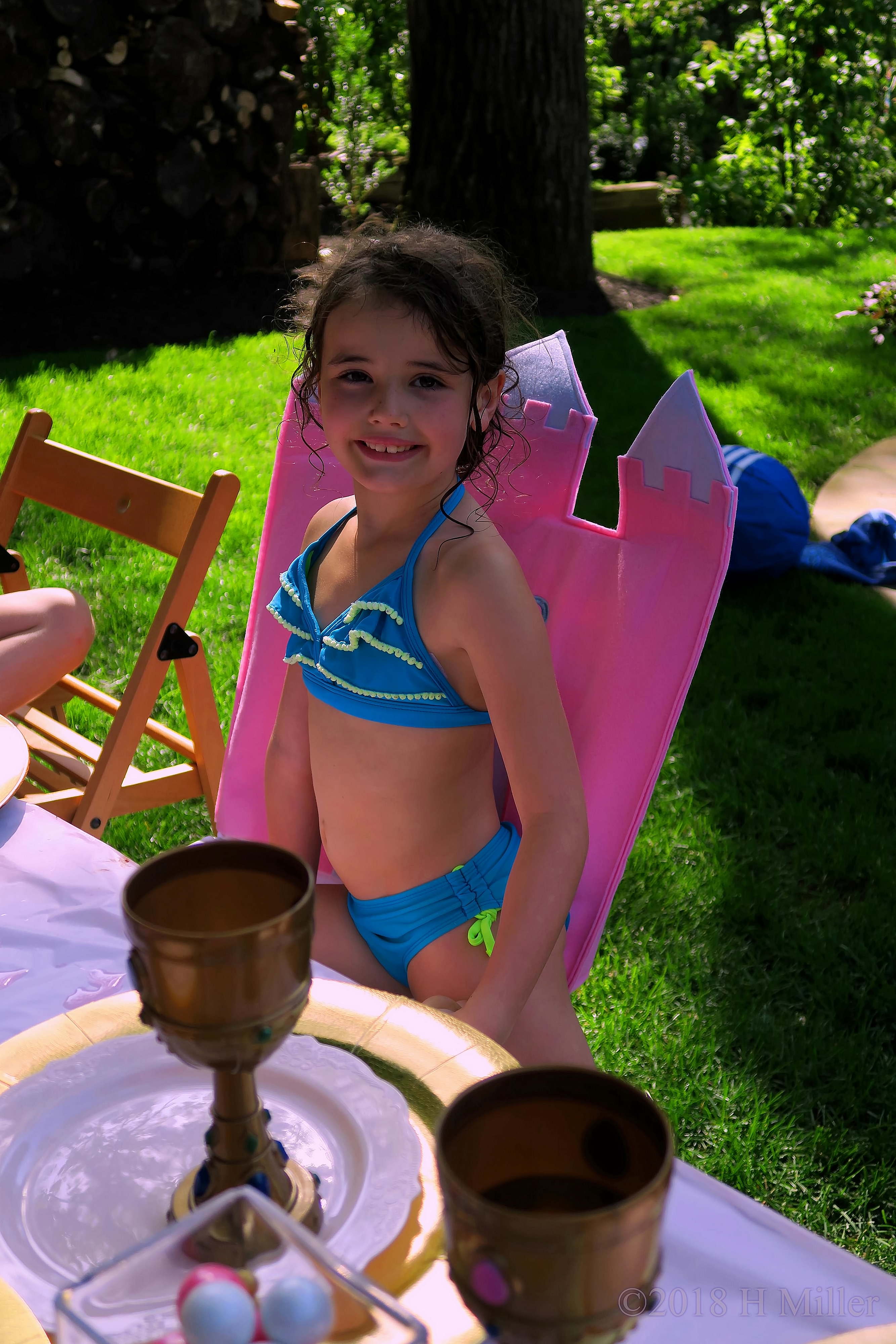 Birthday Girl Sitting In Princess Chair 