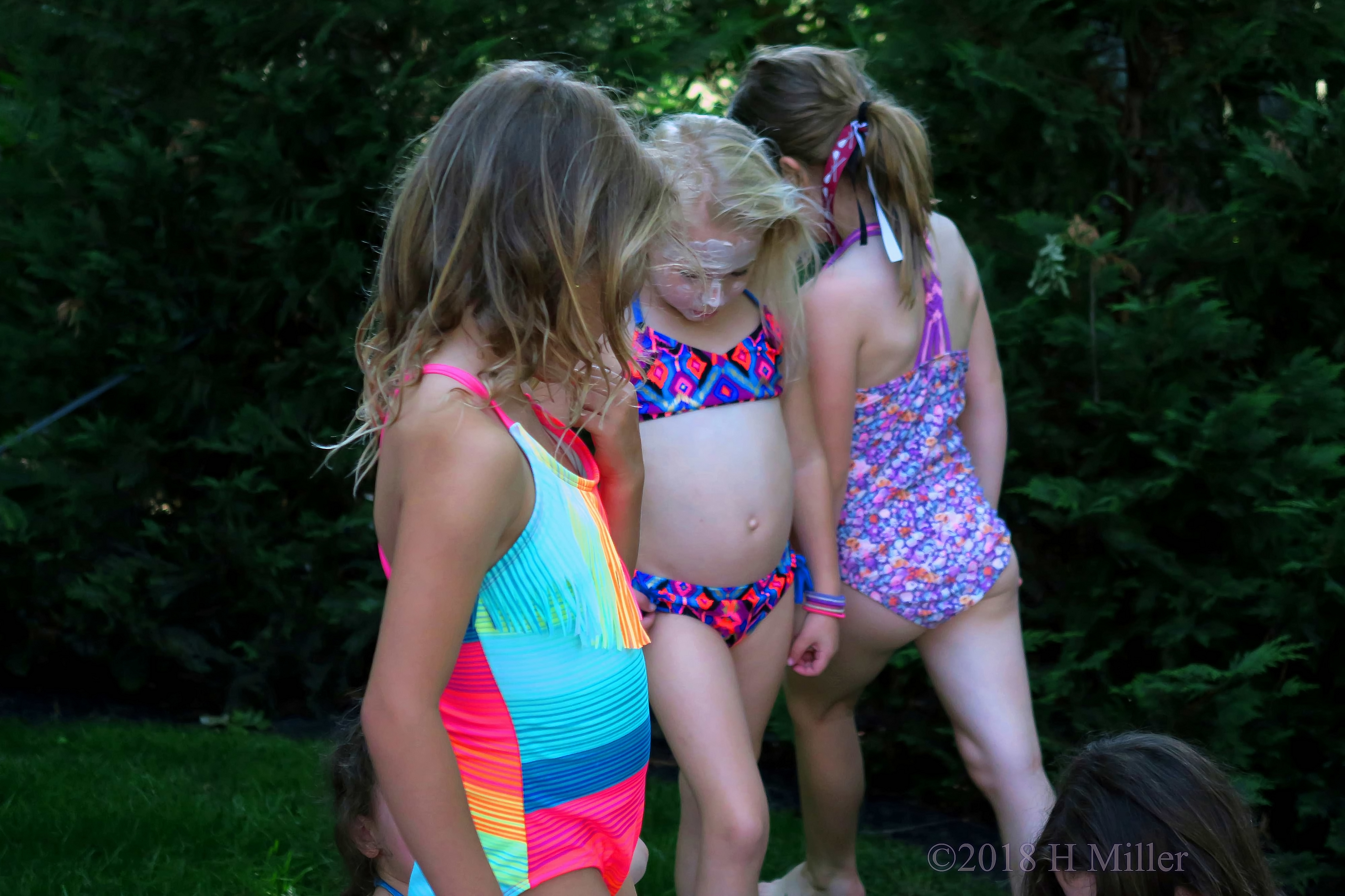 Group Chilling And One Is Still In Her Kids Facial Masques 