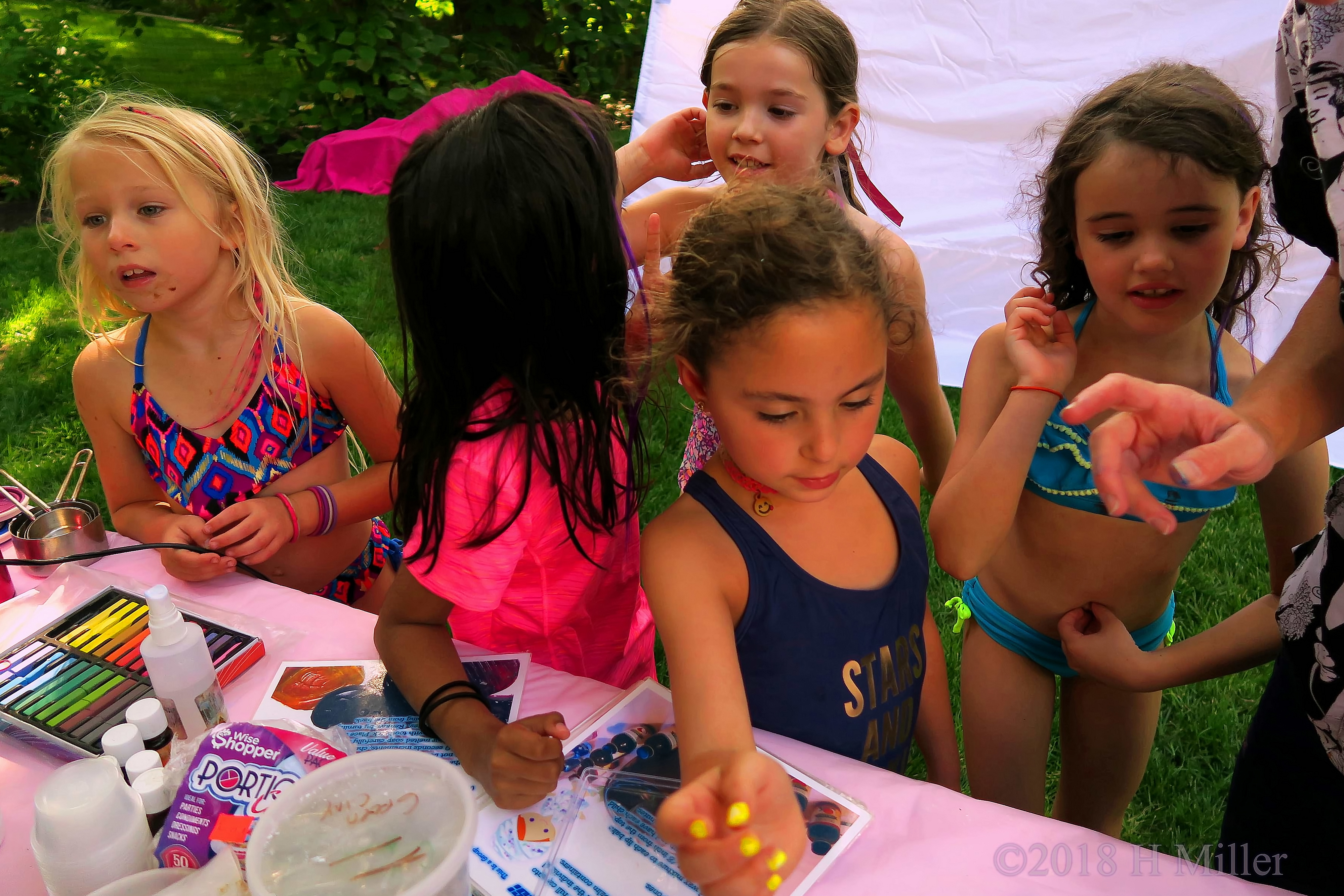 Group Learning To Make Lip Balm Kids Crafts. 4