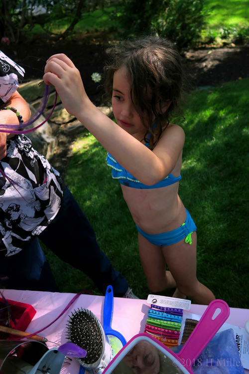 Birthday Girl Choosing Hair Feather 