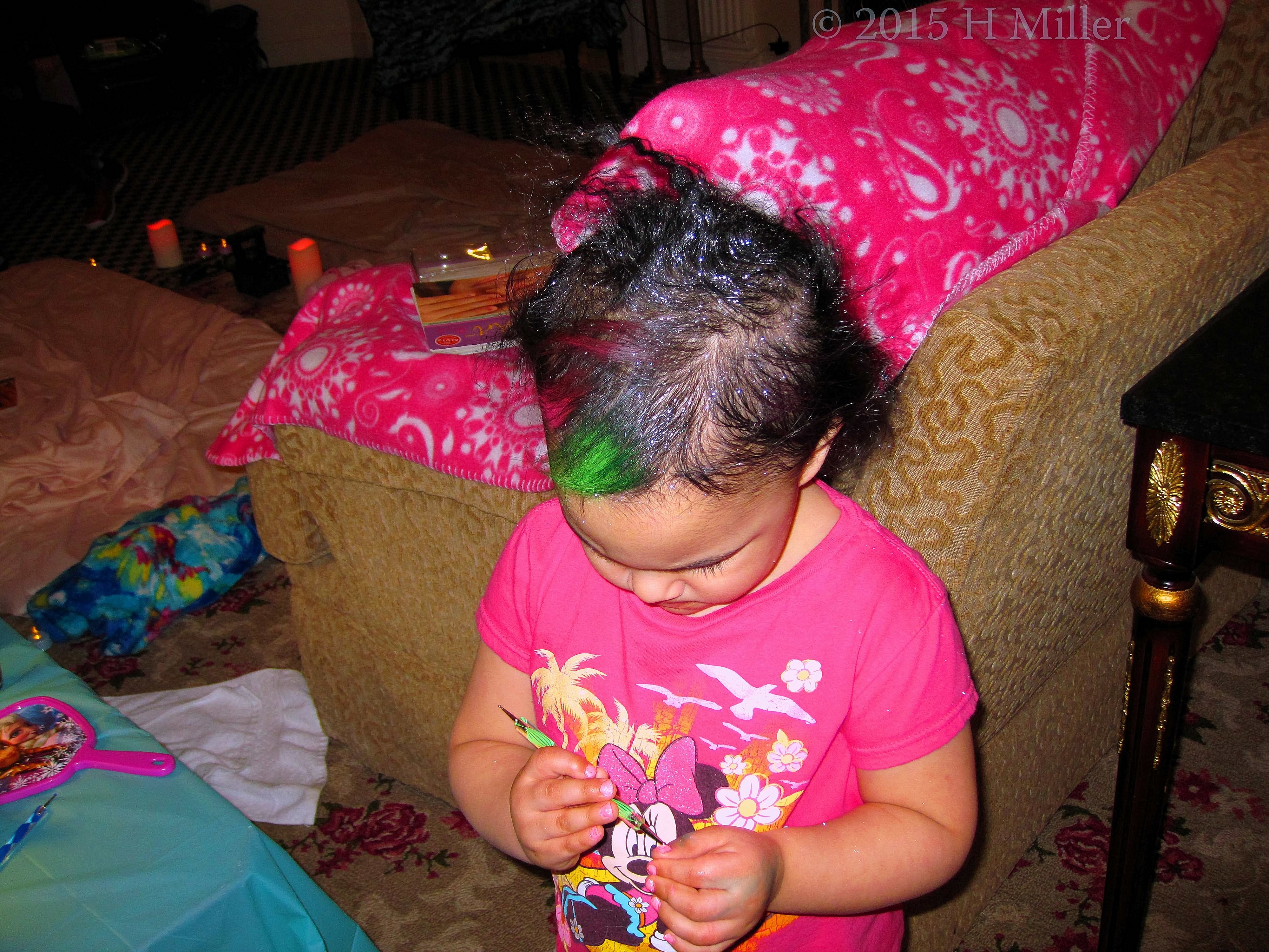 Playing With A Nail Art Tool While HAving her Hair Styled. Playing With A Nail Art Tool While HAving her Hair Styled.