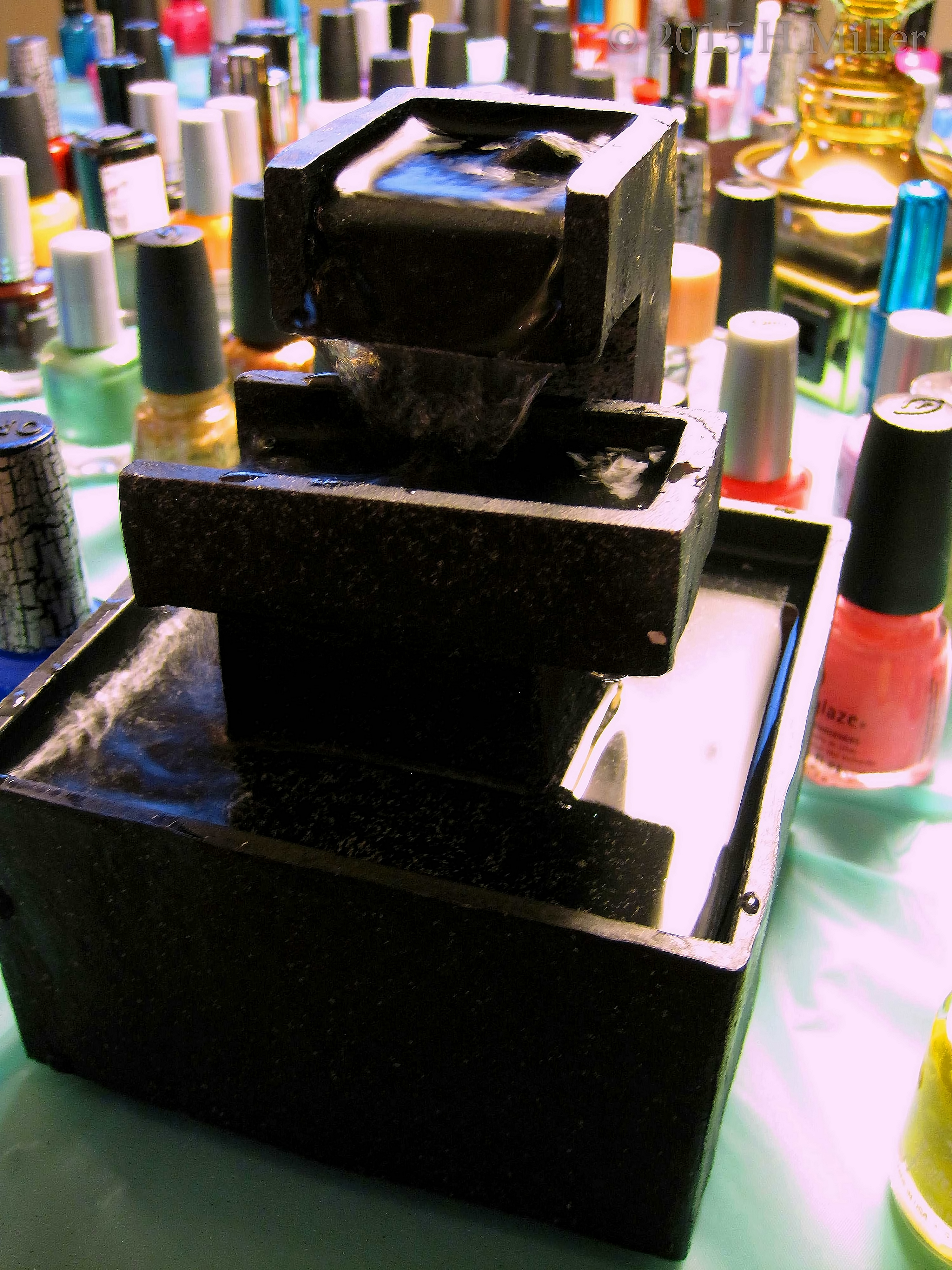 The Soothing Sounds Of A Mini Waterfall Enthrall The Kids And Adults. The Soothing Sounds Of A Mini Waterfall Enthrall The Kids And Adults.