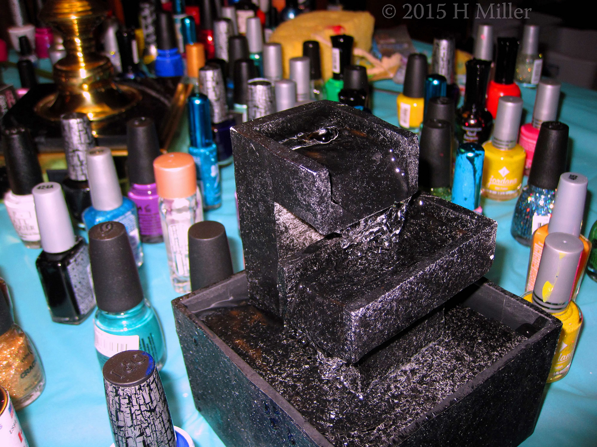Relaxation Fountain And Nail Polish Bottles. 
