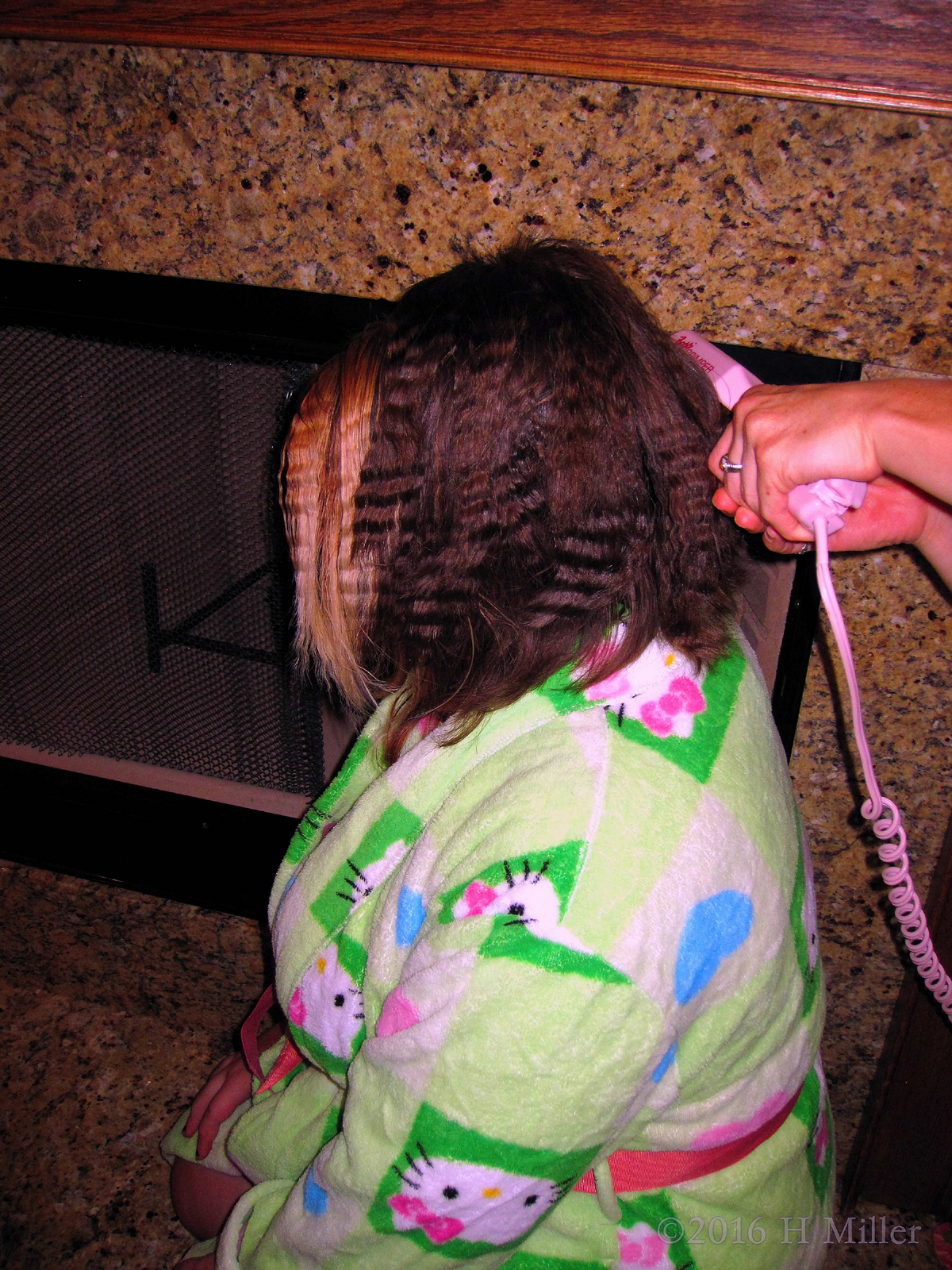 Getting Her Hair Crimped.