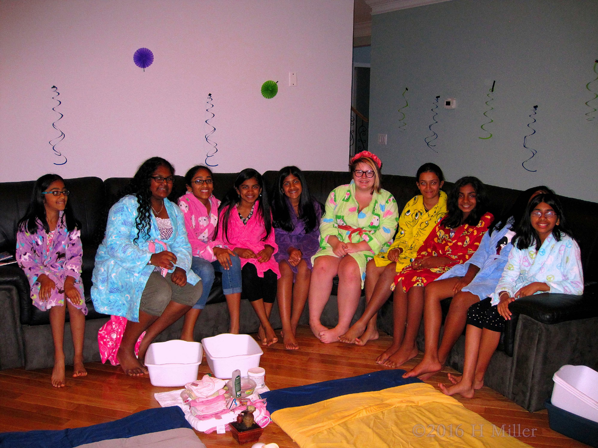 The Girls Are Smiling In Their Spa Robes. 