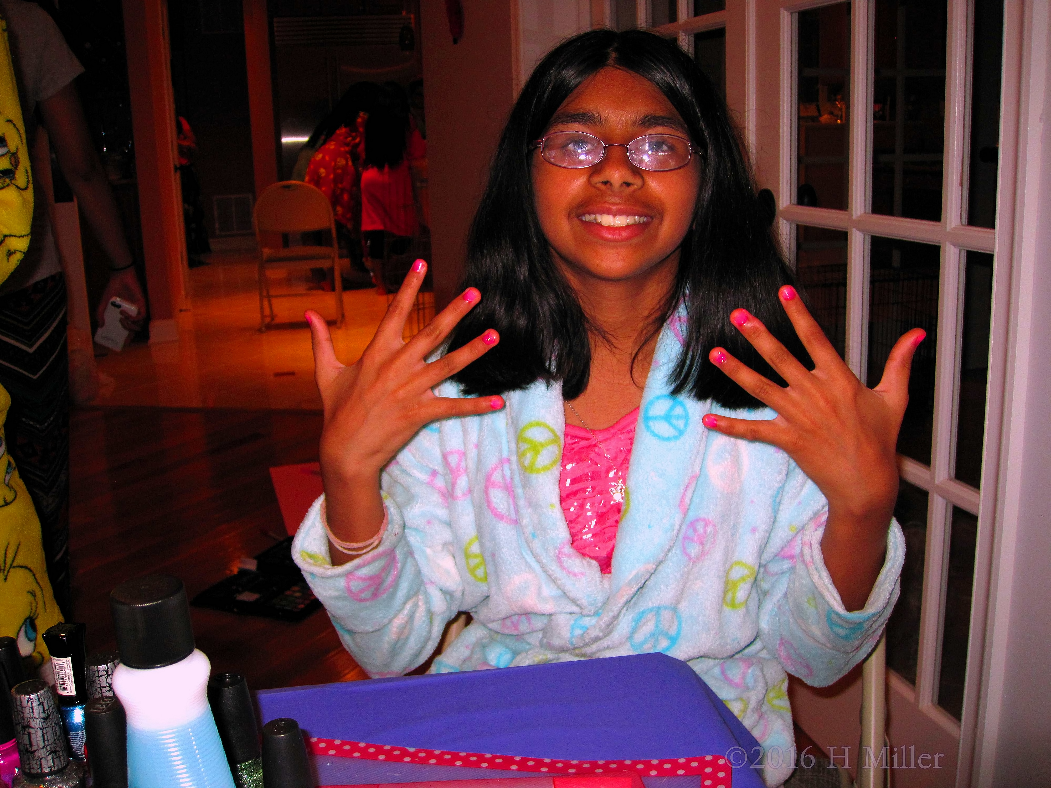 Smiling Wide While Showing Us Her Kids Mini Manicure. Smiling Wide While Showing Us Her Kids Mini Manicure.