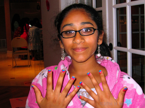 Showing Us Her Mini Mani. Showing Us Her Mini Mani.