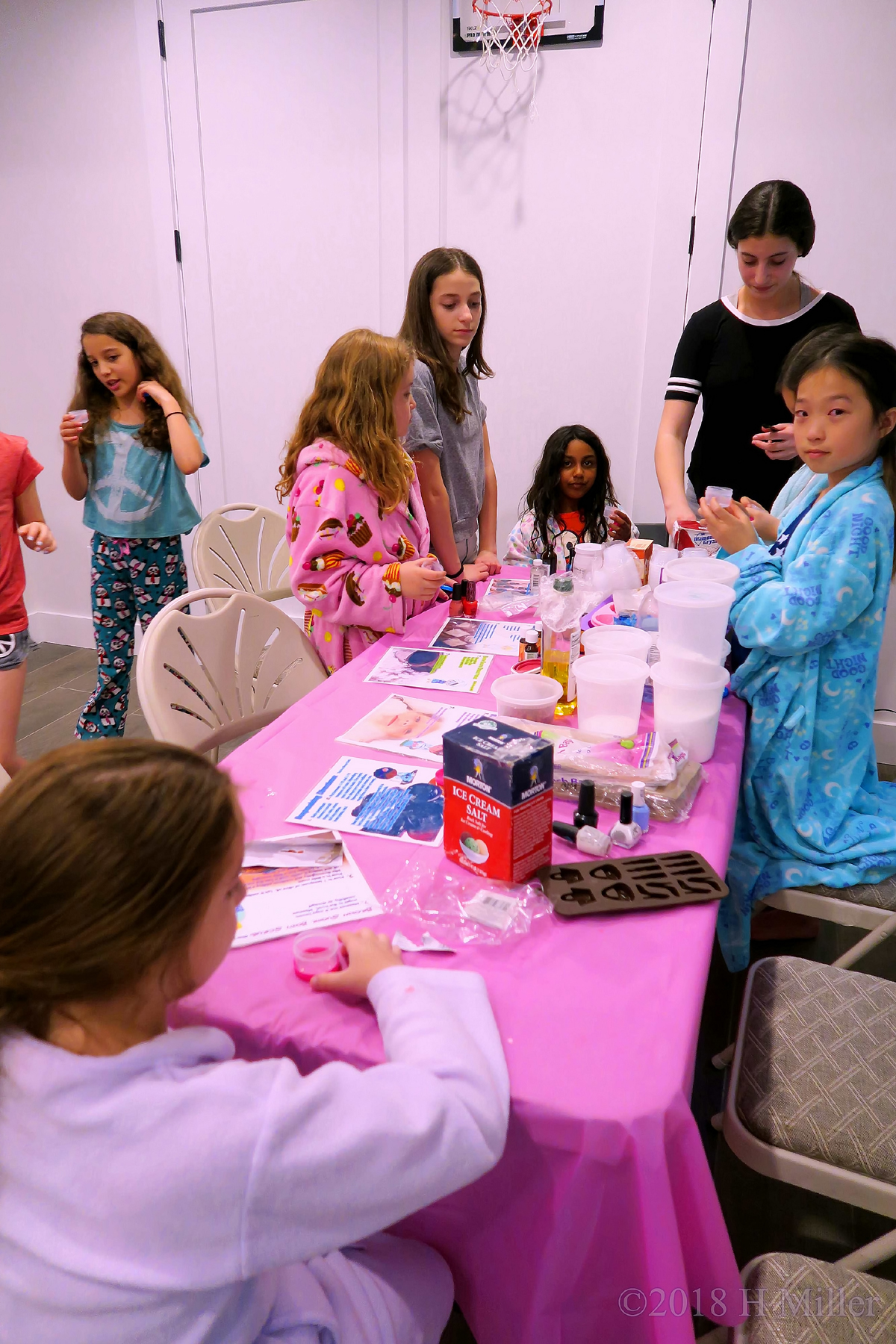 Party Guests Getting Crafty At The Kids Craft Station 