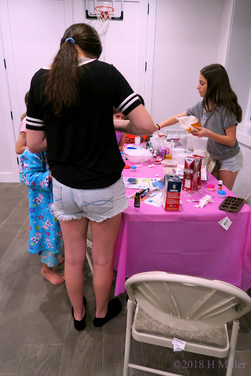 Party Guests Getting Their Kids Craft Items Made
