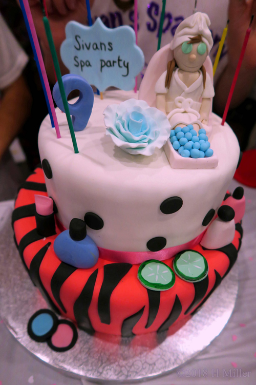 Two Tier Cake Beautifully Decorated With Fun Spa Themed Items Two Tier Cake Beautifully Decorated With Fun Spa Themed Items