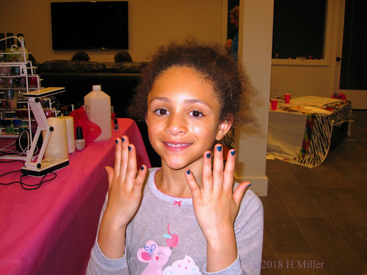 Showing Off Her Sparkly Girls Manicure! 1