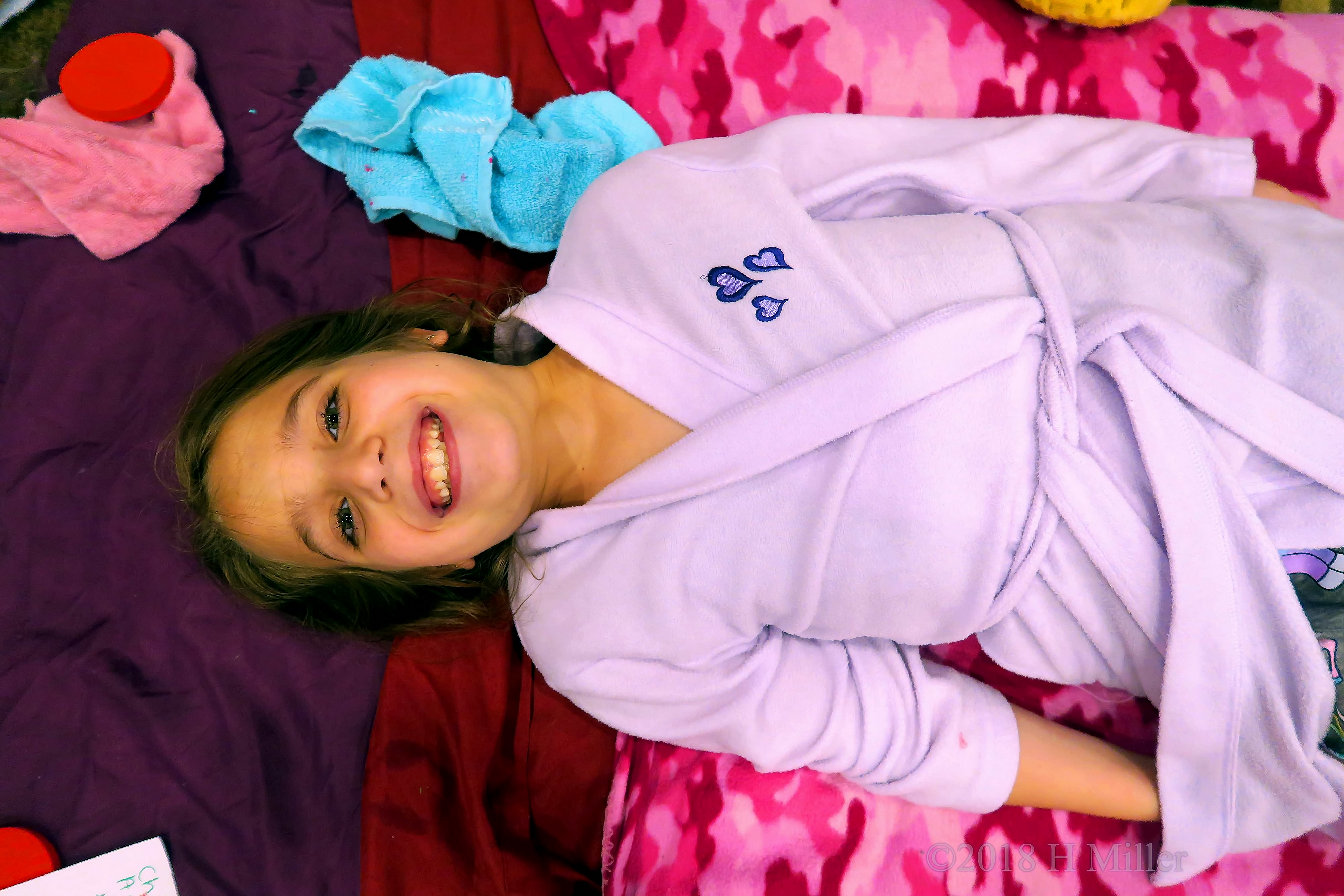 All Smiles As She Waits For Her Kids Facial All Smiles As She Waits For Her Kids Facial