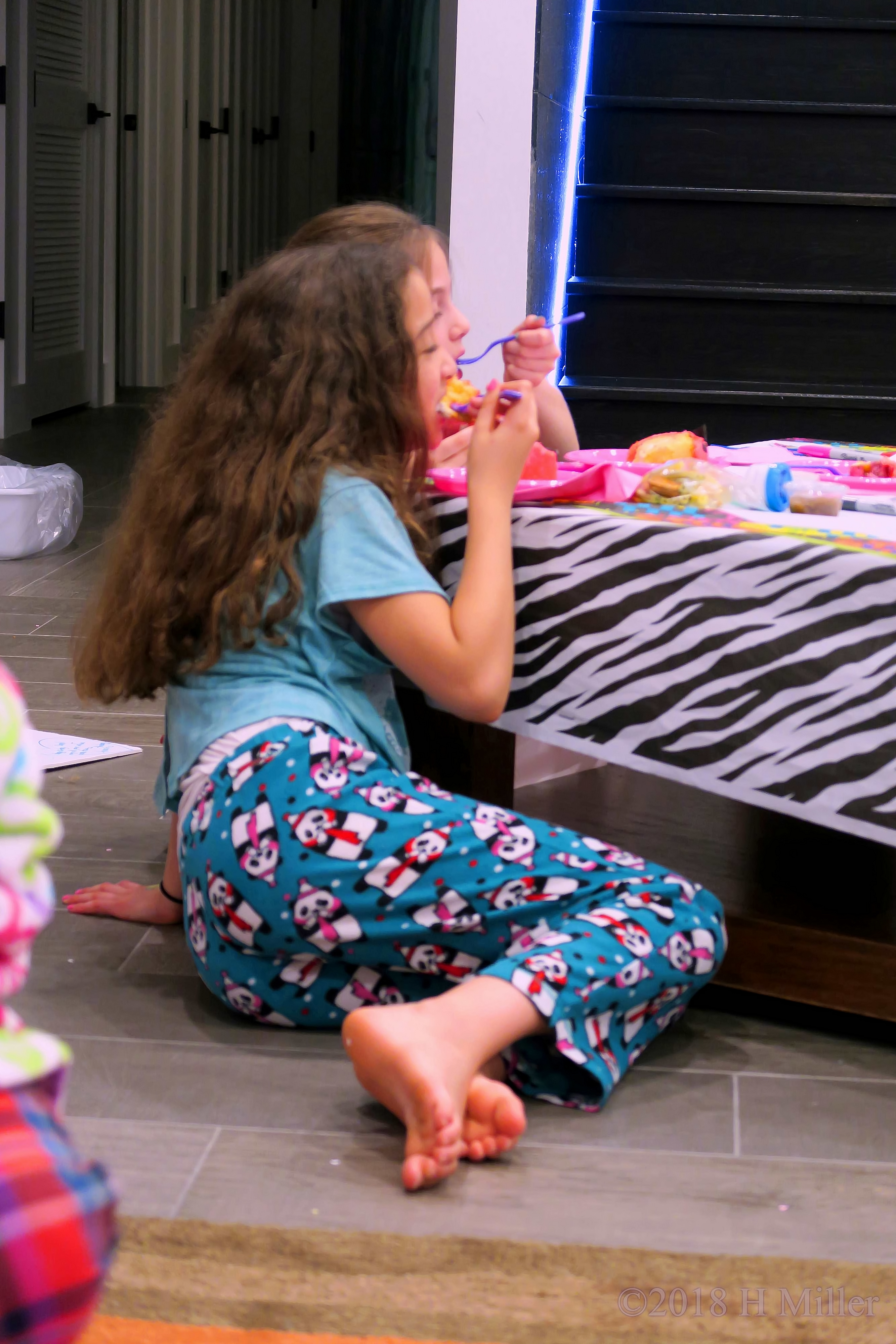 Party Guests Enjoying Their Slice Of Cake Party Guests Enjoying Their Slice Of Cake