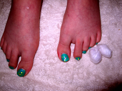 Green Polish Base With Glitter Overlay Girls Pedicure. Green Polish Base With Glitter Overlay Girls Pedicure.