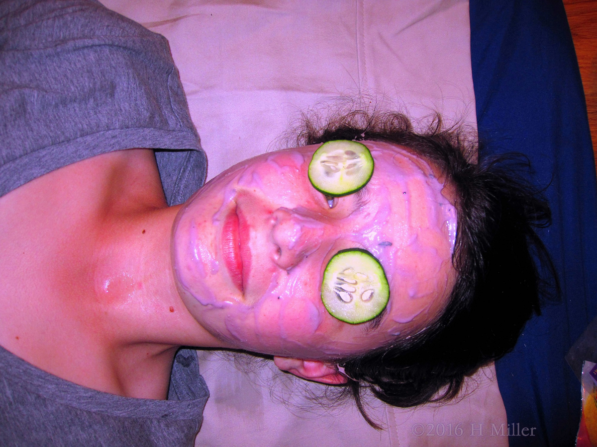 Relaxing In A Girls Spa Face Mask 