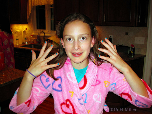 Looking Ecstatic With Her New Kids Spa Manicure Looking Ecstatic With Her New Kids Spa Manicure