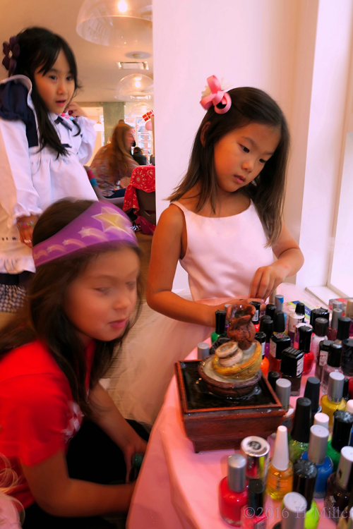 Picking Out Nail Polish For The Kids Spa Manicures.