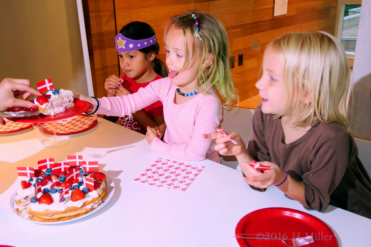 Handing Out Kids Birthday Cake 