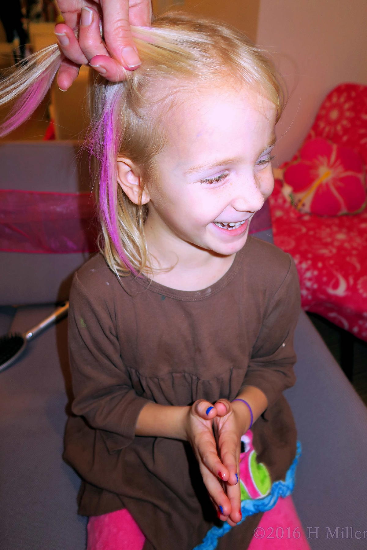 Laughing While Getting Her Hair Done At The Girls Spa Party 