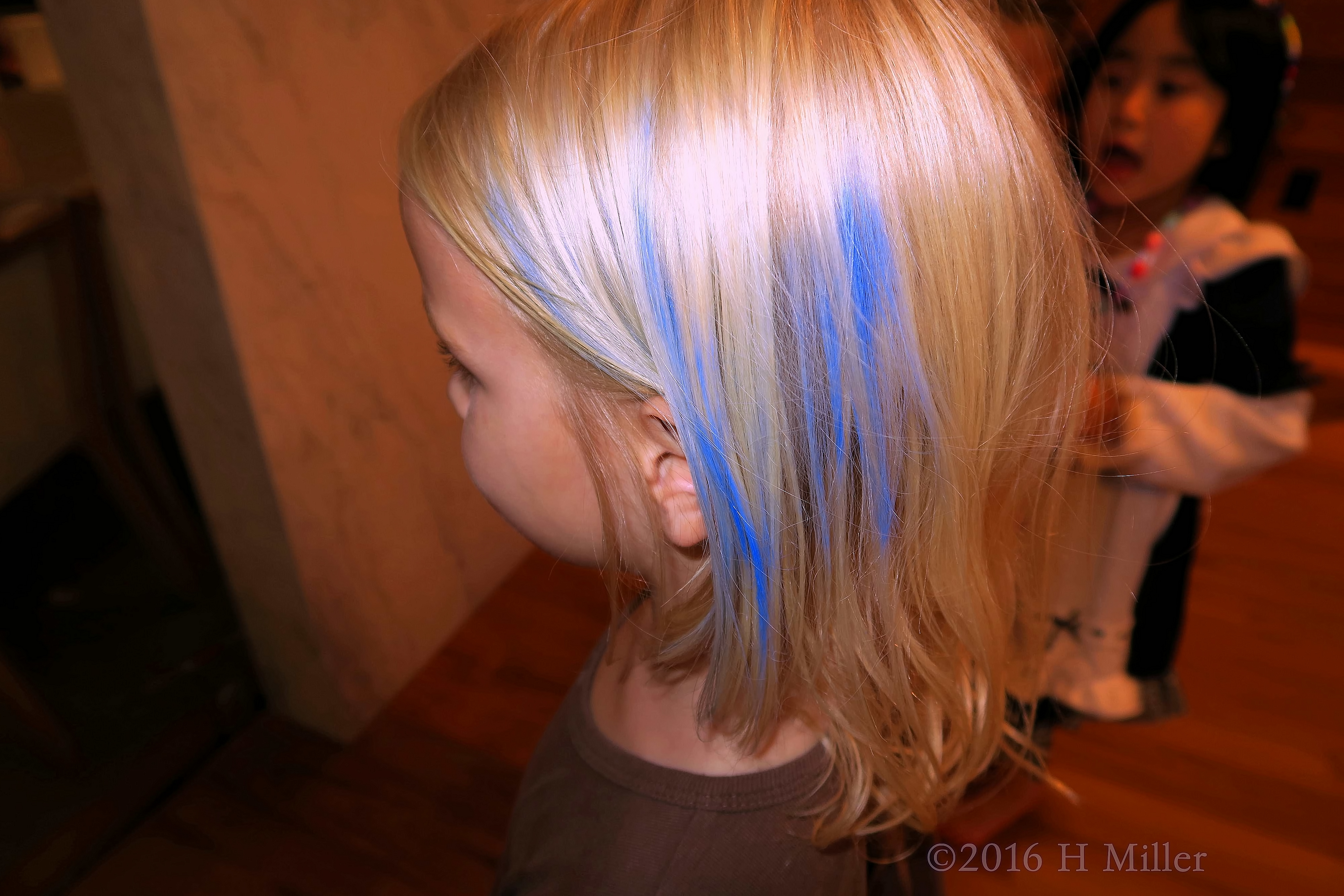 Soft Blue Hair Streaks Made With Temporary Hair Chalk. 