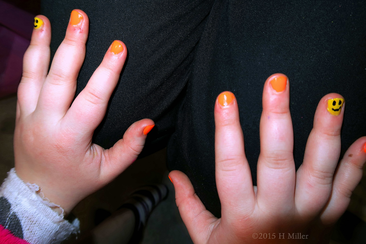 Bright Orange And Yellow Happy Face Nail Art 