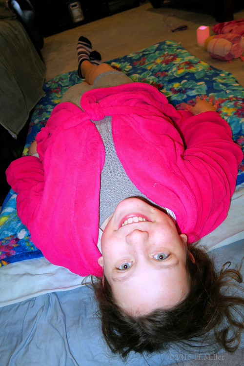 Laying Down At The Kids Spa Party, She's Excited For Her Facial Laying Down At The Kids Spa Party, She's Excited For Her Facial