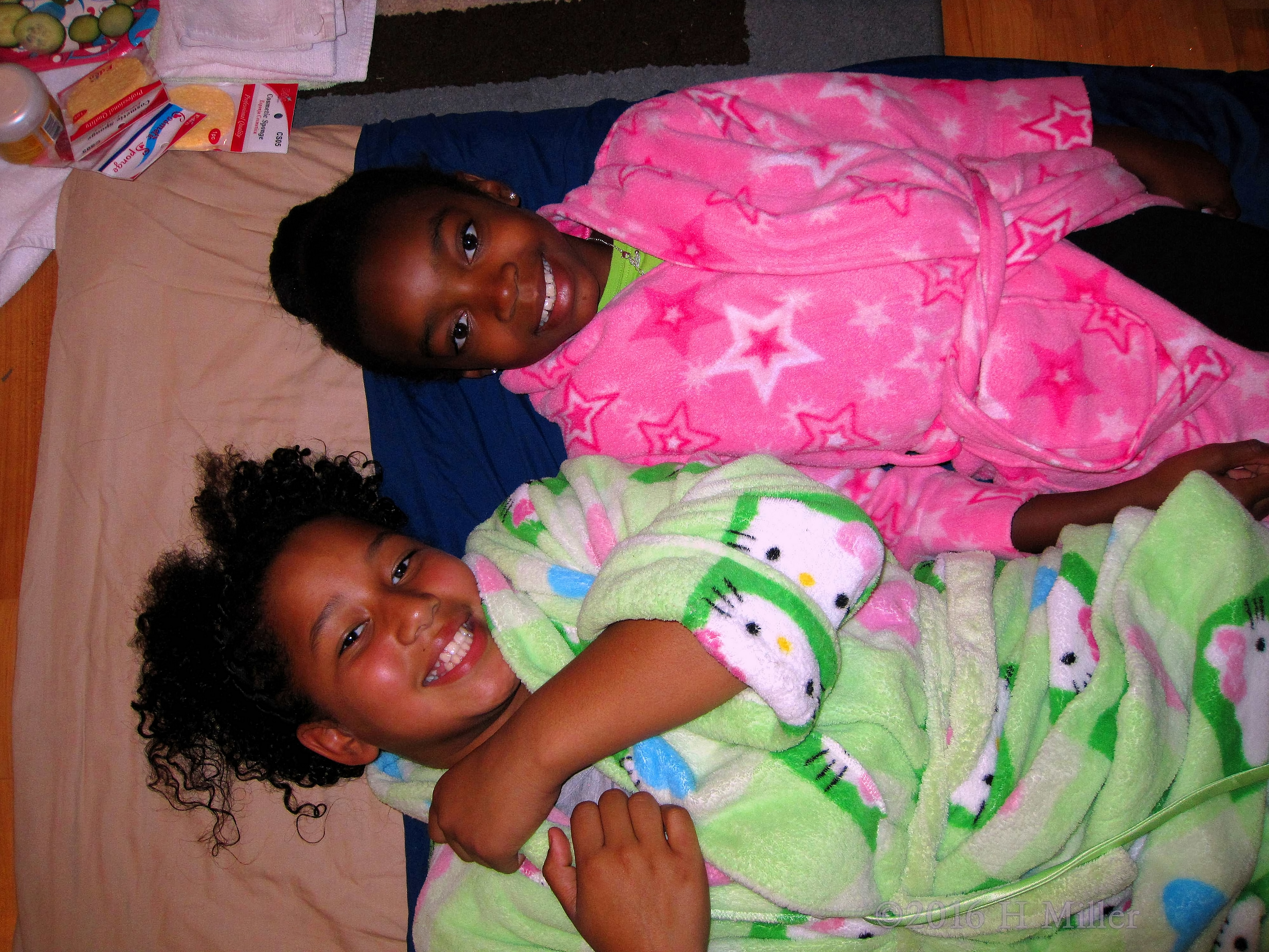 Party Guests Chilaxing In Hello Kitty And Sparkling Star Spa Robes 