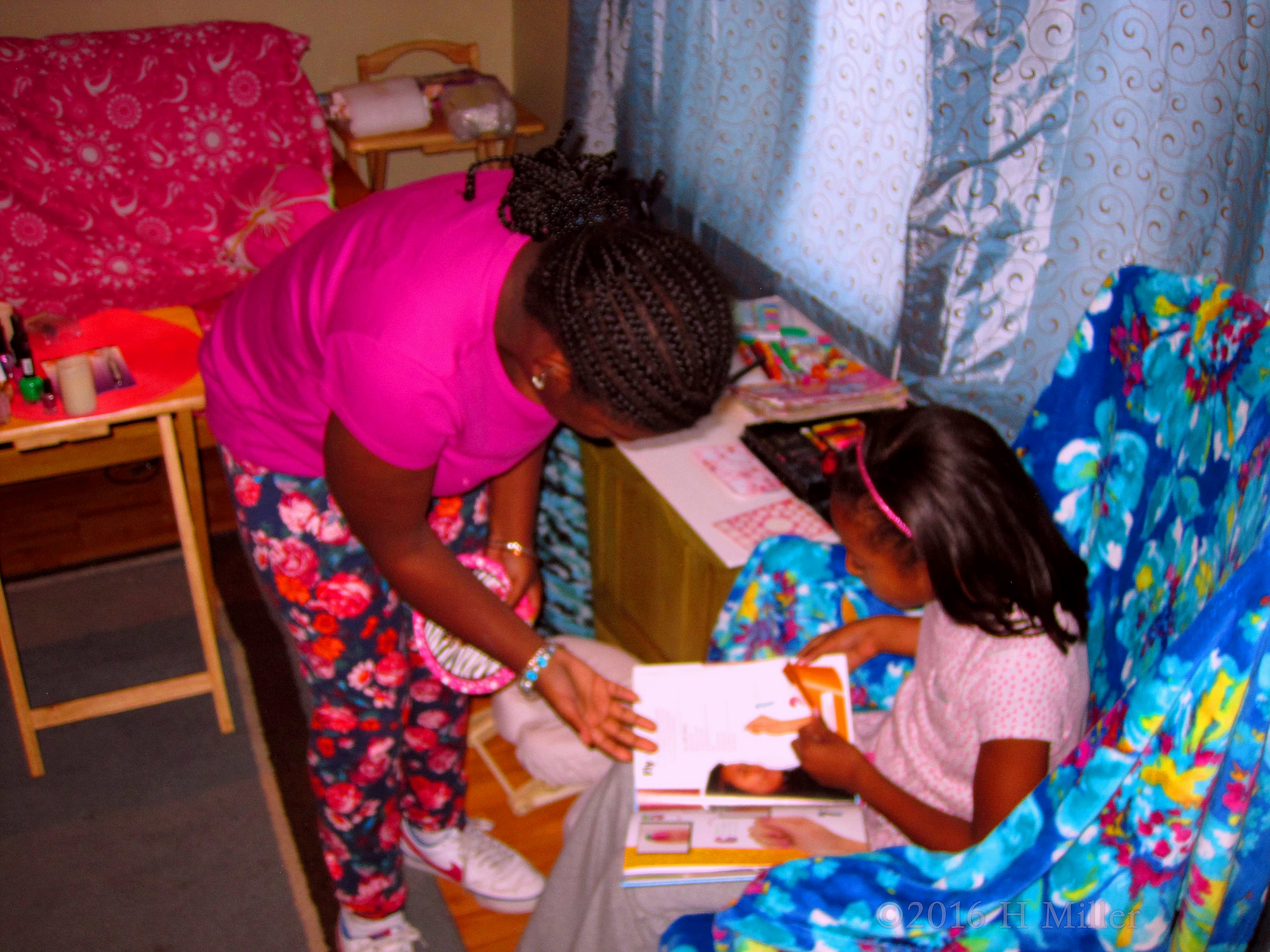 Party Guests Look Through The Nail Art Design Book For Ideas Party Guests Look Through The Nail Art Design Book For Ideas