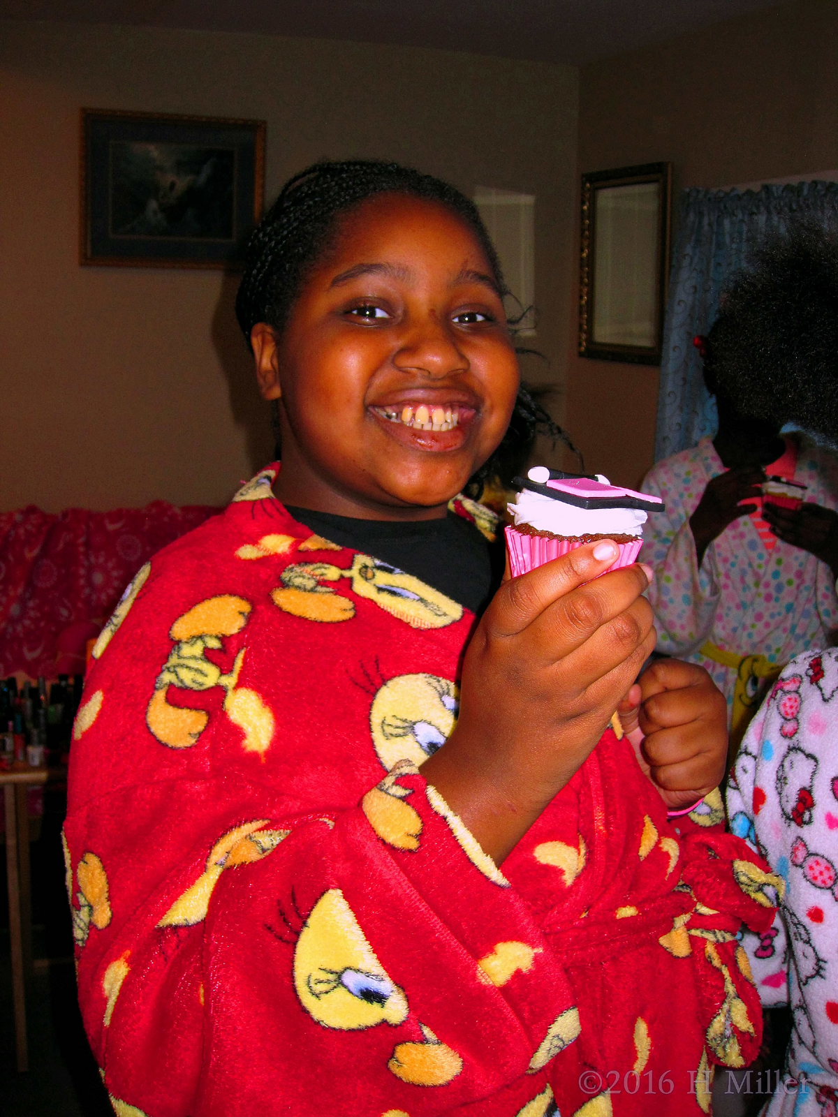 All Smiles While Showing Of Her Makeup Cupcake 