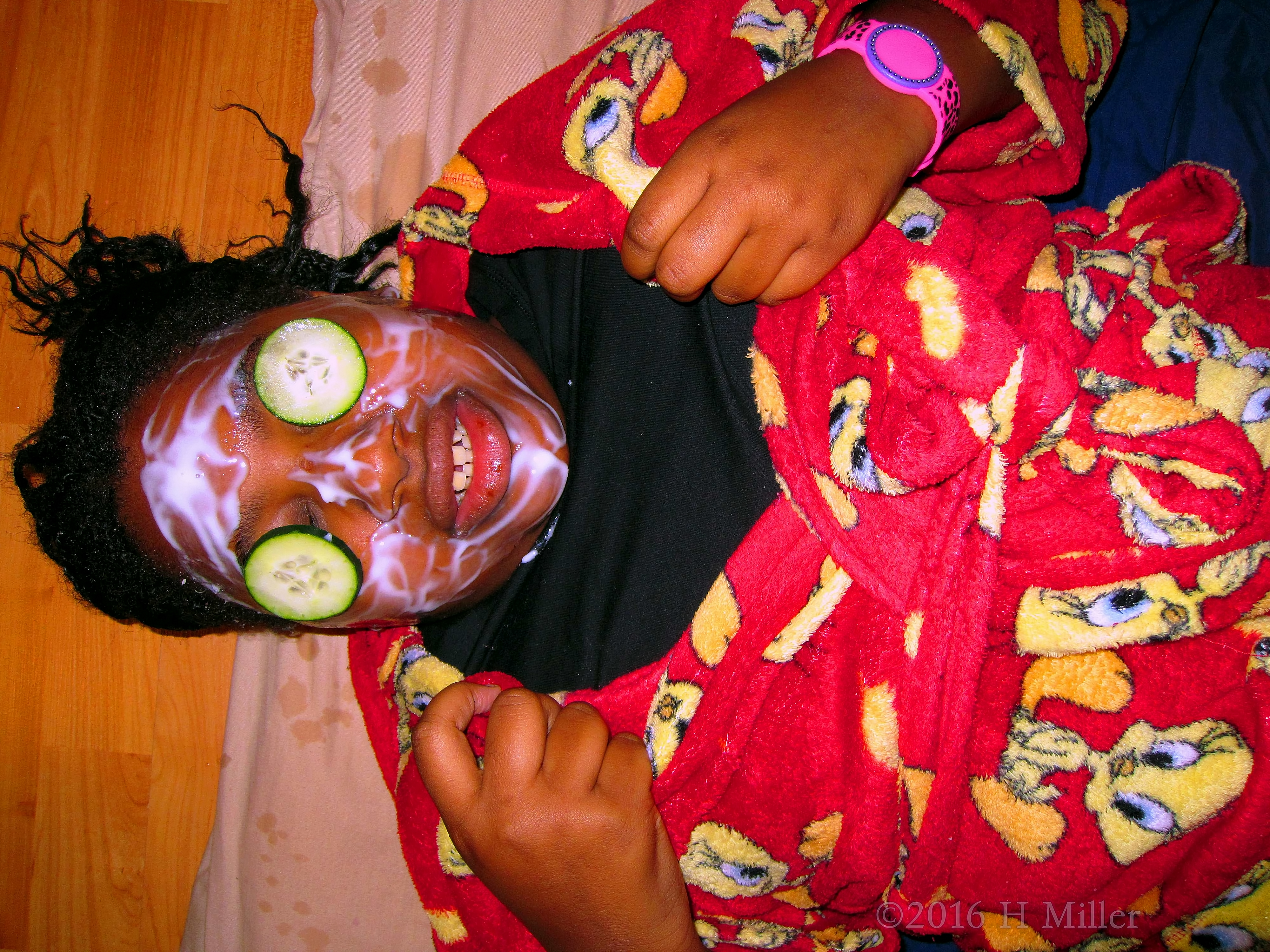 Relaxing While Getting Her Kids Facial Done Relaxing While Getting Her Kids Facial Done