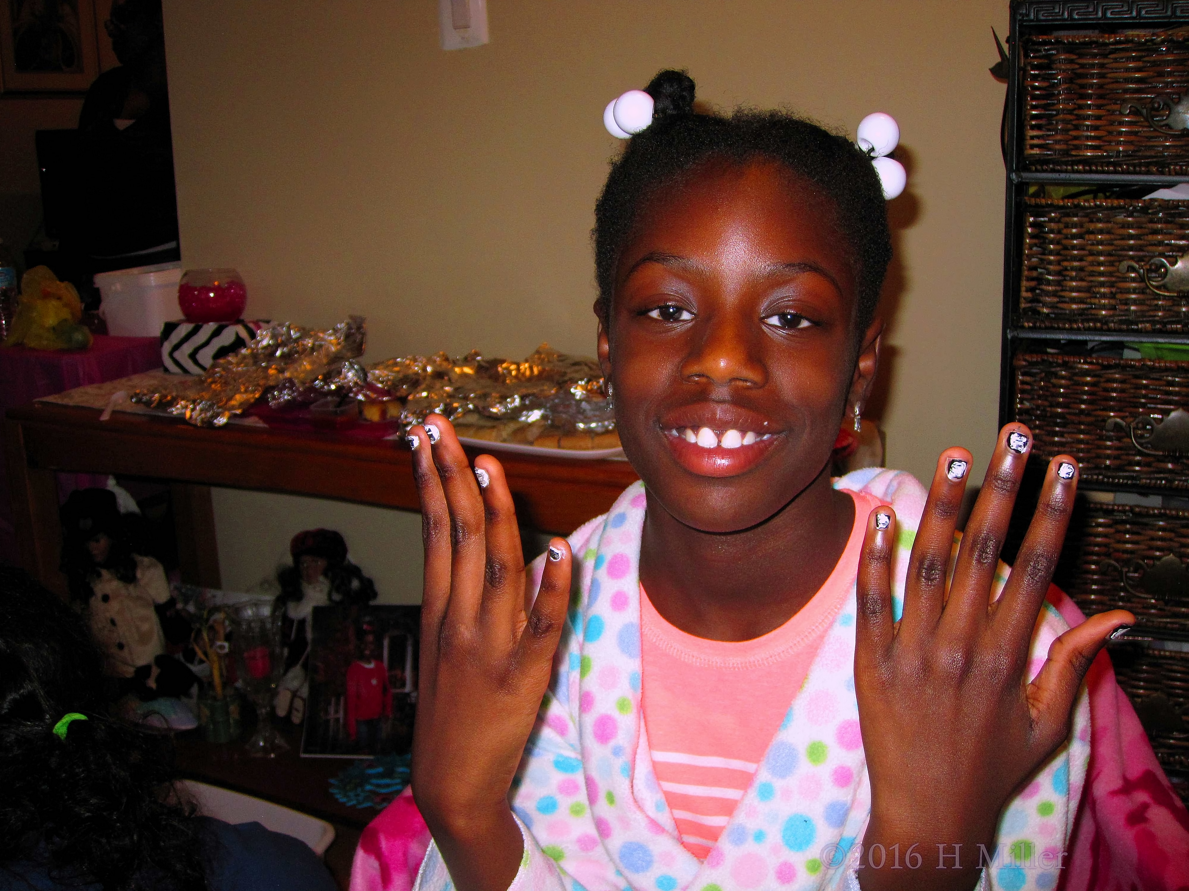 Showing Of Her Kids Manicure 