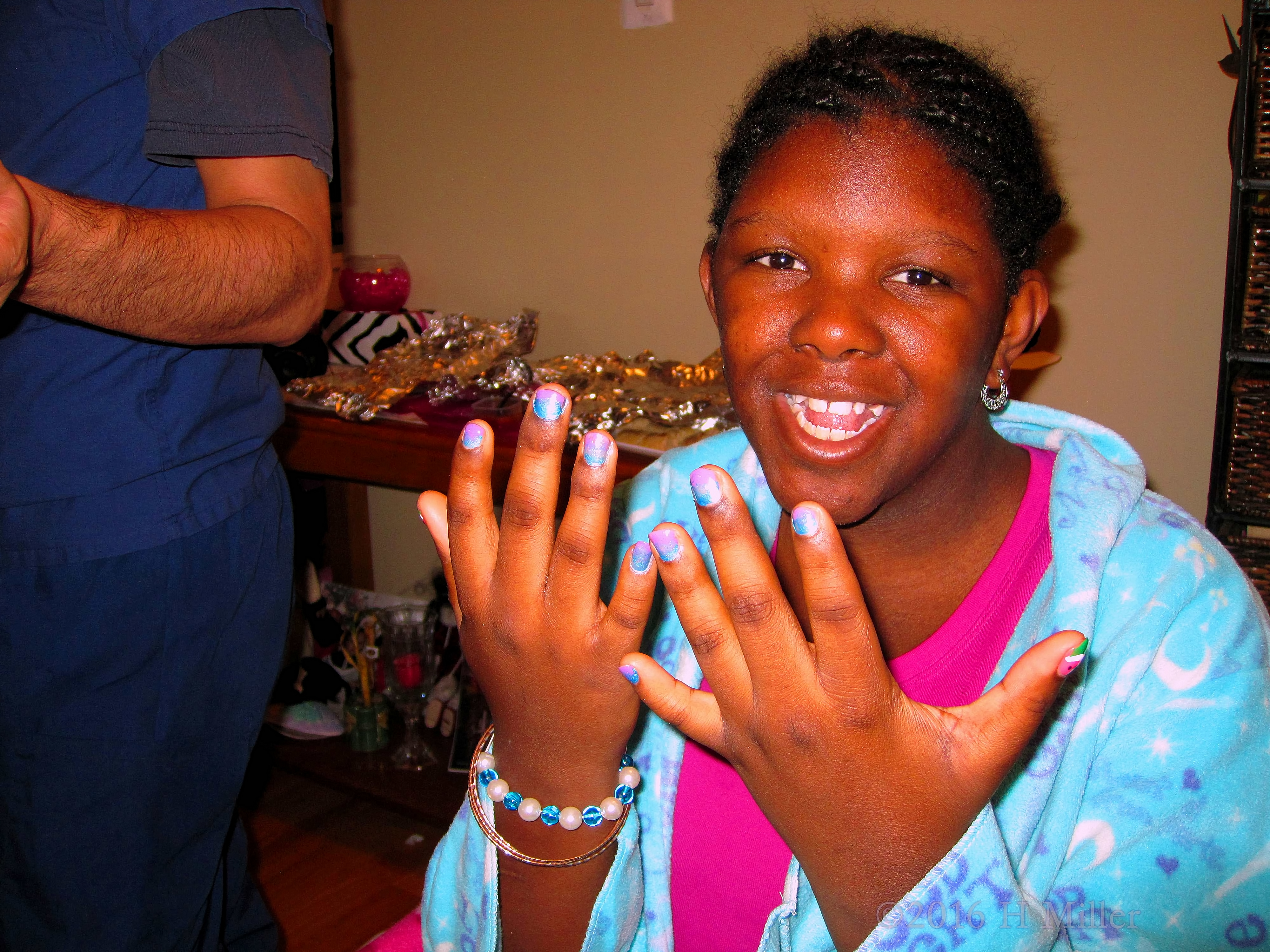 Showing Off The Nail Design She Chose And She Loves It