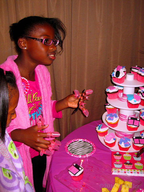 Close Up Of The Birthday Girl In A Kids Spa Themed Cupcake Drea