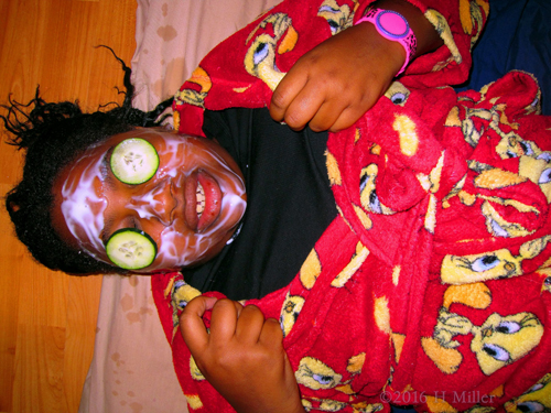 Relaxing While Getting Her Kids Facial Done Relaxing While Getting Her Kids Facial Done